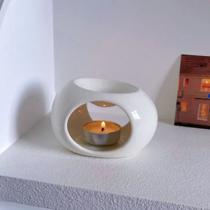 Brûleur céramique blanc brillant Omerys — rituel aromathérapie sommeil et gestion du stress