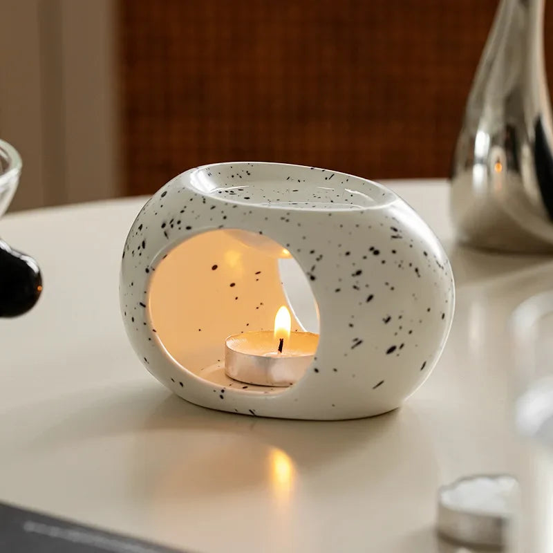 Brûleur céramique blanc moucheté avec bougie — chaleur douce pour diffuser huiles essentielles calmantes