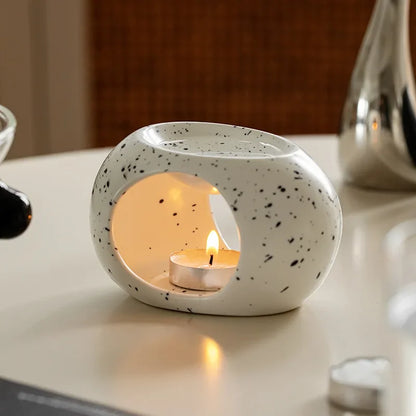 Brûleur céramique blanc moucheté avec bougie — chaleur douce pour diffuser huiles essentielles calmantes